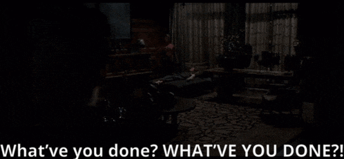 a man is laying on a couch in a dark room with the words what 've you done what 've you done