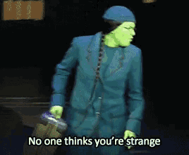 a woman in a blue suit says no one thinks you are strange