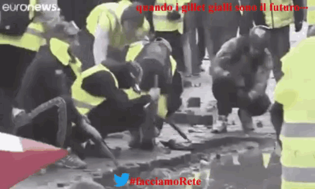 a group of people in yellow vests are kneeling down in a puddle with the words euronews written above them