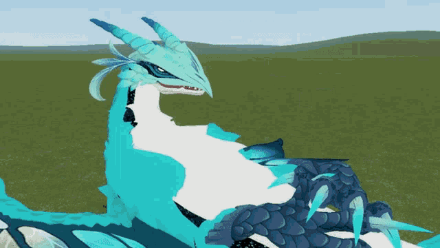 a blue and white dragon is standing in a grassy field
