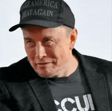 a man wearing a black hat that says take america great again