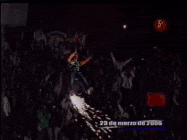 a tv screen shows a fireworks display on the 23 de marzo de 2006