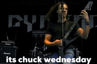 two men playing guitars on a stage with the words " its chuck wednesday " above them
