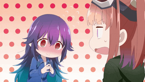 a girl with purple hair is standing next to another girl with pink hair