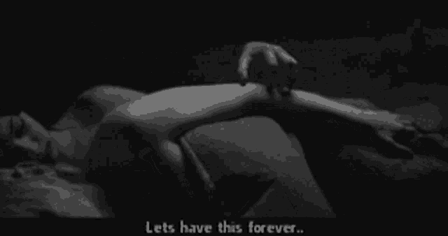 a black and white photo of a woman laying down with the words " lets have this forever "