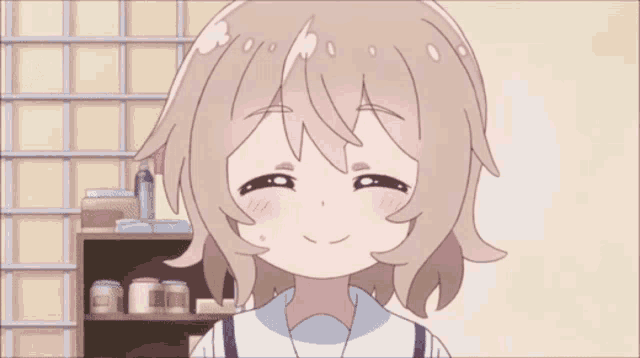 a girl in a white uniform is smiling in front of a shelf with jars on it .