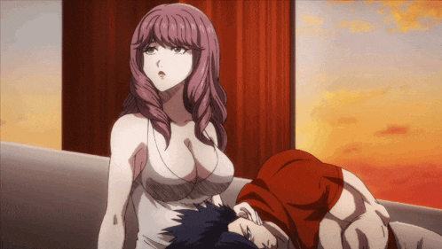 a woman is standing next to a man who is laying down