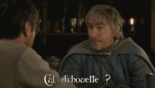 a man in a cape is talking to another man and the caption says cul d' chozette