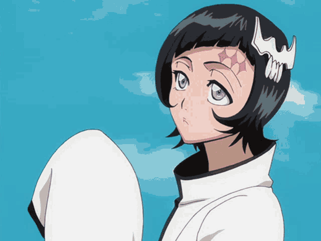 a girl with black hair and purple eyes has a skull clip on her head
