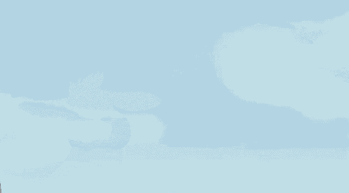 eeyore from winnie the pooh is standing in front of a cloudy sky .