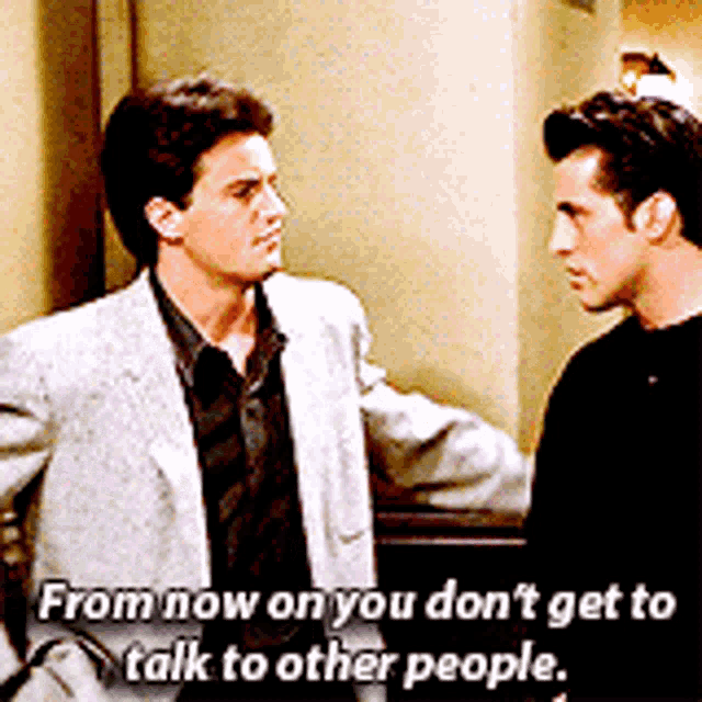 two men are standing next to each other with the words from now on you don t get to talk to other people