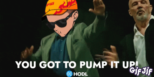 a gif of a man in a suit dancing with the words you got to pump it up