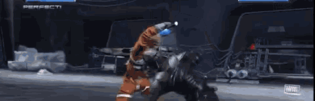 two men are fighting with lightsabers in a video game and one of them is holding a lightsaber .