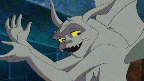 a cartoon drawing of a monster with yellow eyes