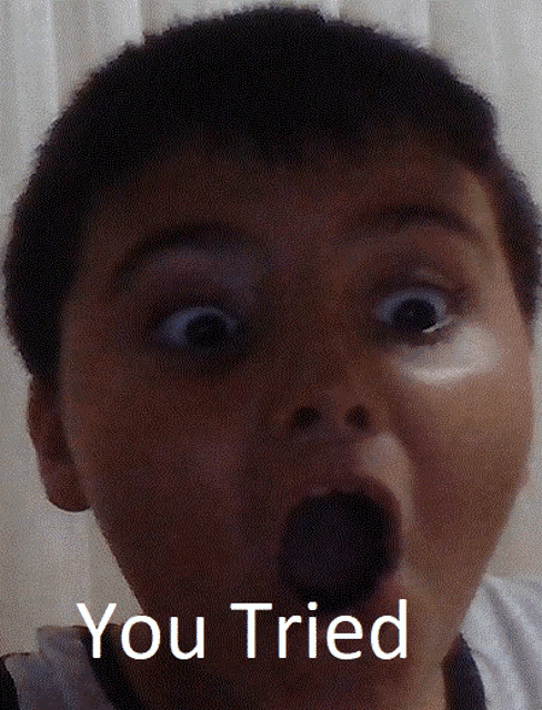 a child with a surprised look on his face and the words " you tried " above him