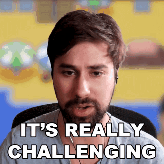 a man says it 's really challenging in front of a yellow background