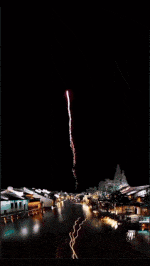 a painting of a town at night with a lightning bolt coming out of the sky