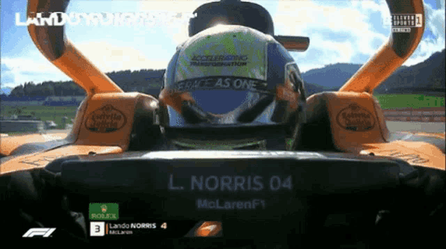 a close up of a race car with a helmet that says accelerating transformation