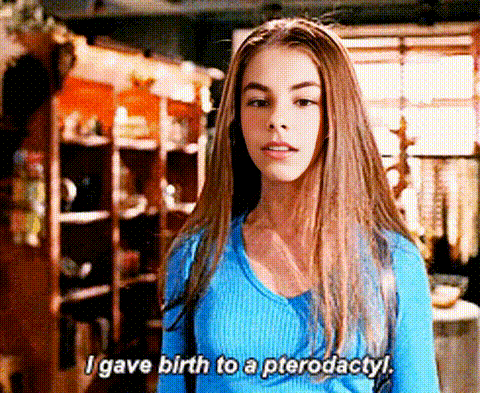 a woman in a blue sweater says i gave birth to a pterodactyl .