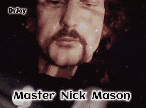 a close up of a man 's face with the name nick mason on the bottom