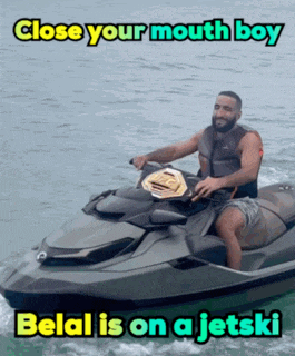 a man is riding a jet ski with the caption " close your mouth boy "