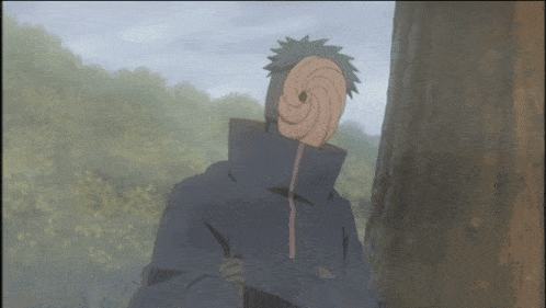 a man with a mask on his face stands in front of a tree
