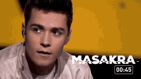 a close up of a man 's face with the word masakra on the bottom right