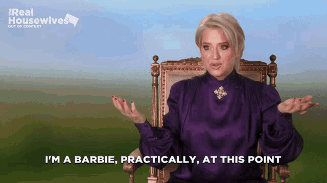 a woman sitting in a chair with the words i 'm a barbie practically at this point written on the bottom