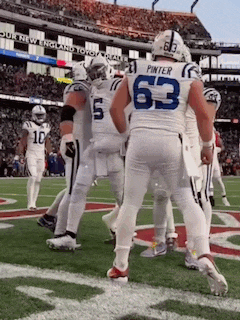 a football player with the number 63 on their jersey