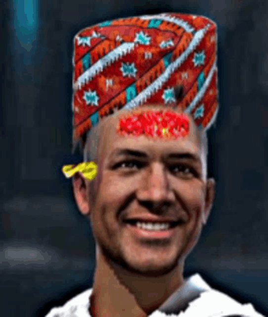a man wearing a red hat with a flower on his forehead