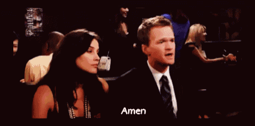 a man in a suit and tie is giving a woman a high five and the word amen is on the bottom right