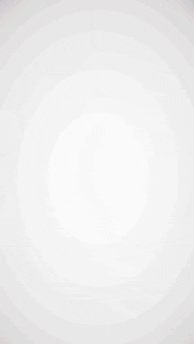 a blurred image of a person 's face with a white background and a purple background