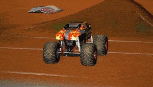 a monster jam advertisement is behind a monster truck on a dirt track
