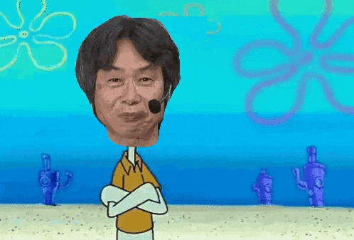a man with a microphone on his head is standing in front of spongebob squarepants characters .
