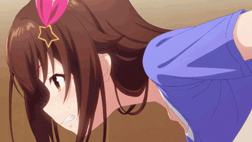a brown haired anime girl with a star on her head