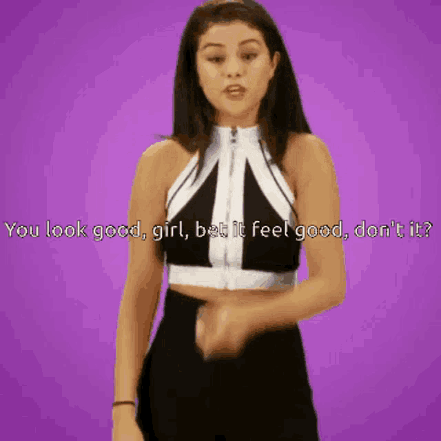 a woman in a black and white crop top says you look good girl but it feel good don 't it