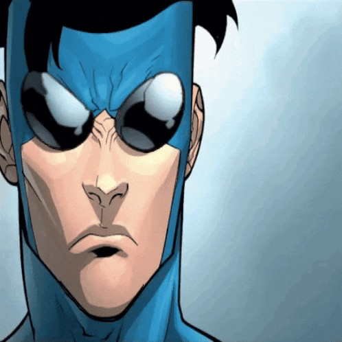 a close up of a comic book character 's face with a blue mask