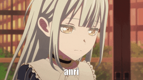 a girl with long white hair has the word anri written on her face