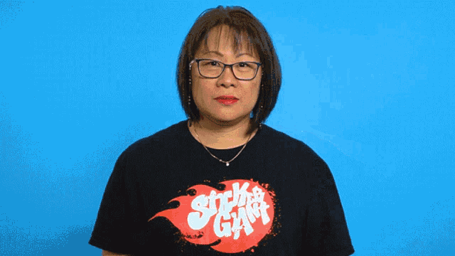 a woman making a funny face with the words time and cards above her head