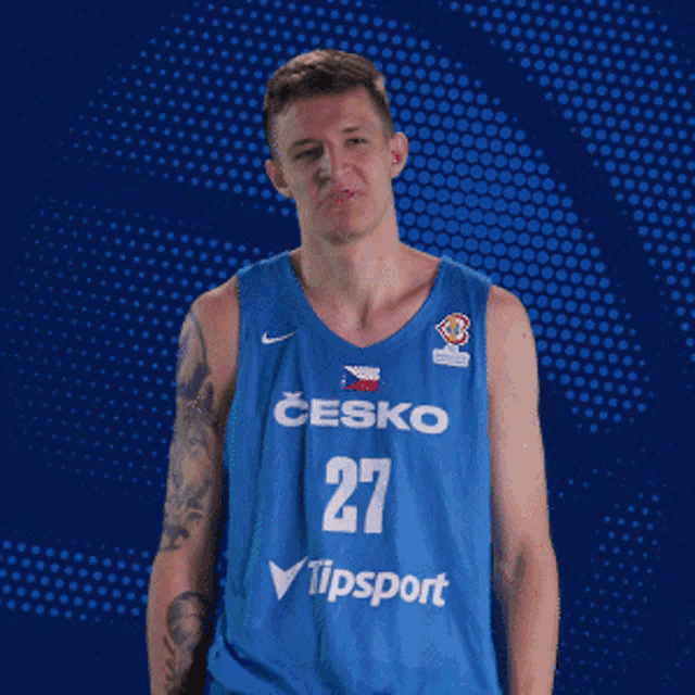 a man wearing a blue jersey that says ' czecho 27 tipsport ' on it