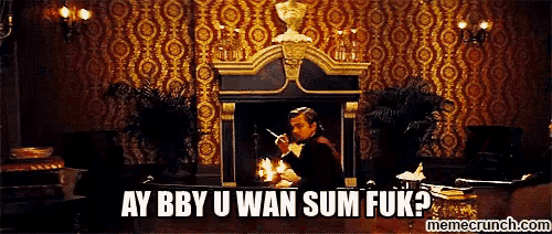 a man smoking a cigarette in front of a fireplace with ay bby u wan sum fuk written on the bottom