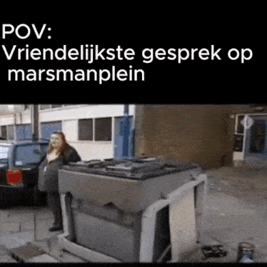 a video of a woman standing next to a trash can with a caption in a foreign language .