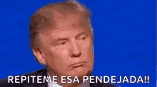 a close up of donald trump 's face with the words repiteme esa pendejada .