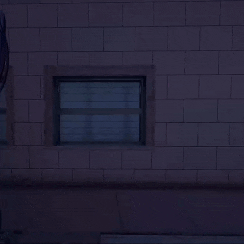 a girl with red hair and blue eyes is standing in front of a window
