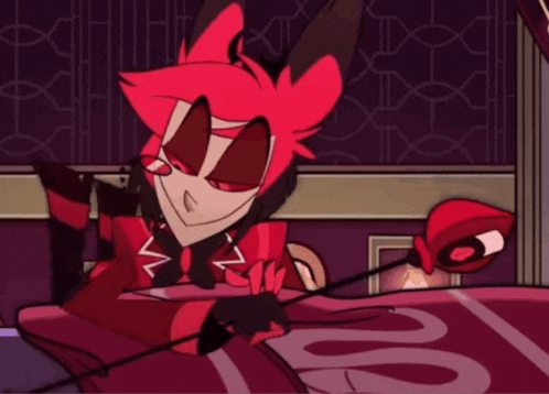 a cartoon character with red hair is sitting on a bed with a snake on it
