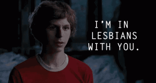 a man in a red shirt is saying i 'm in lesbians with you .