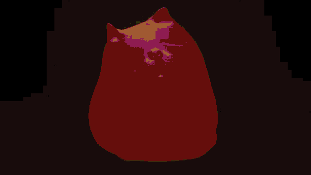 a yellow statue of a cat with its eyes closed on a black background
