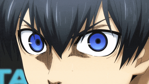 a close up of a person 's eyes with the letter a in the corner