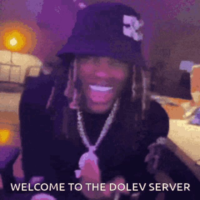 a man wearing a bucket hat and a necklace says welcome to the dolev server .