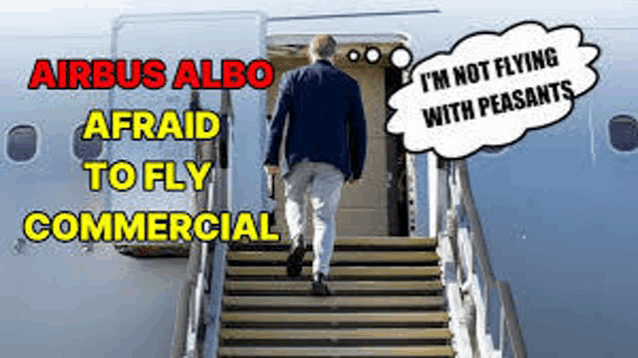 a man is walking up the stairs of an airbus airbus albo commercial jet .